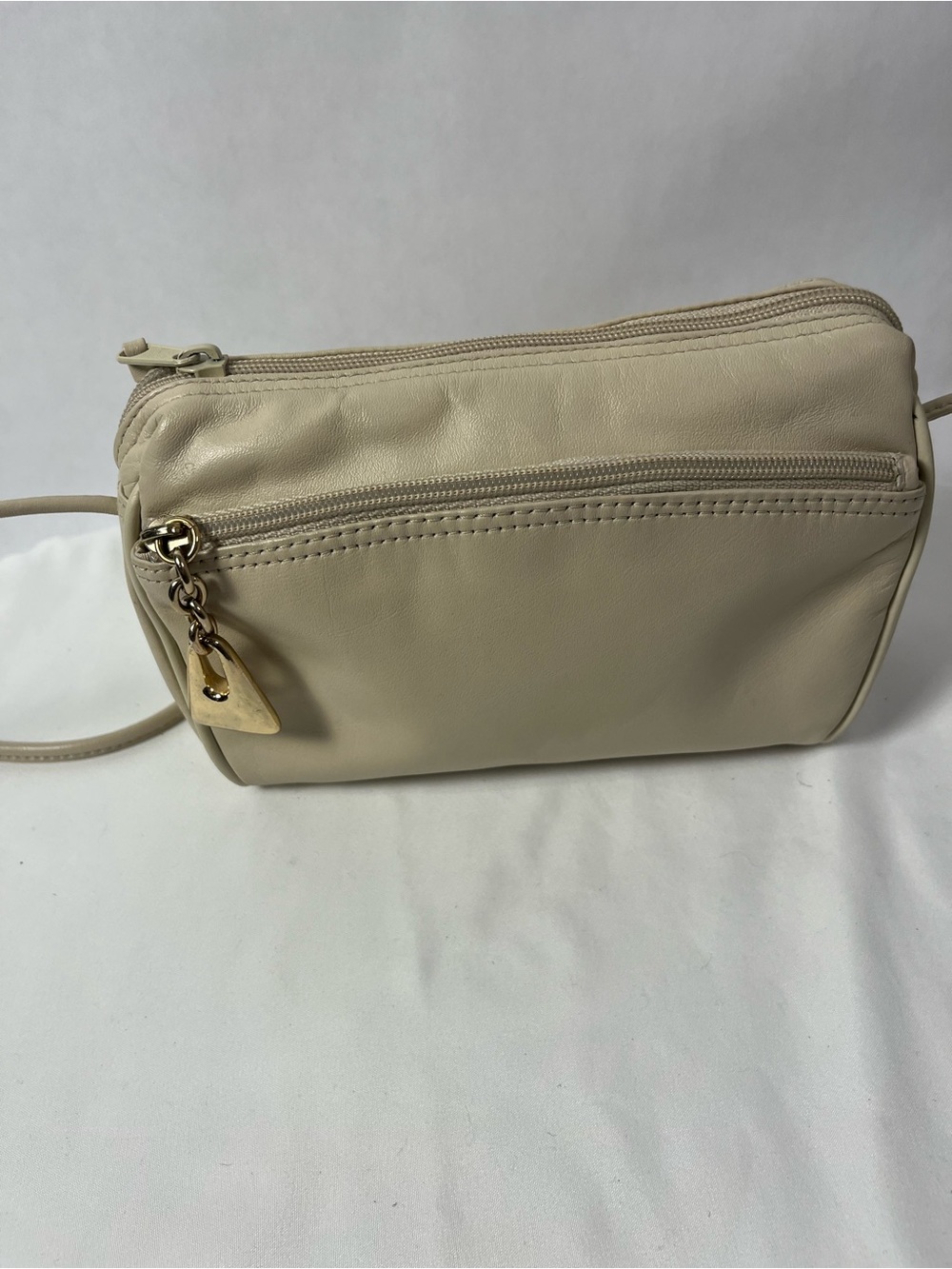 Gianni Bernini small cream crossbody with gold charm